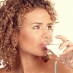 woman-drinking-glass-of-water