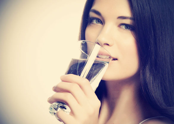 Beautiful-Young-Woman-drinking-glass-of-water