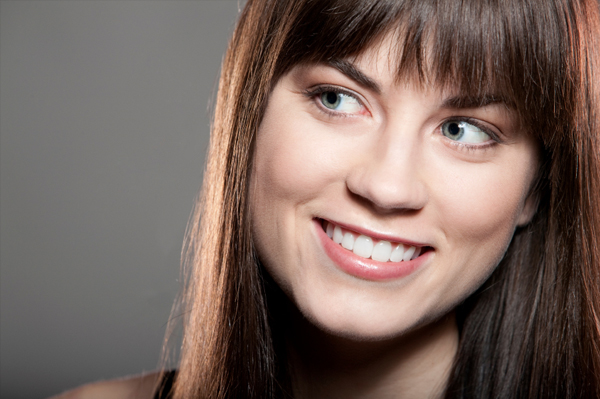 woman-with-smooth-straight-hair-and-bangs