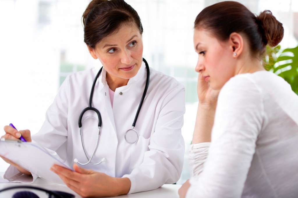 doctor with female patient