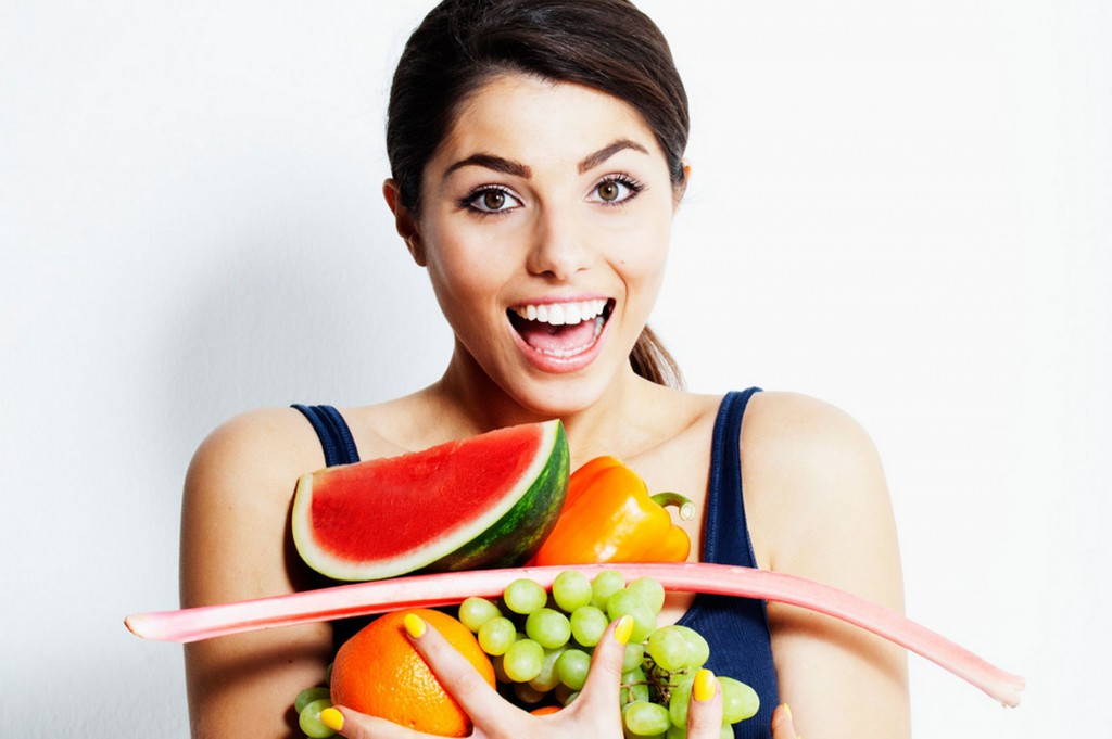 Woman carrying fruit