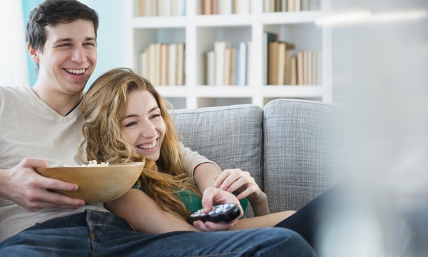 Couple watching TV together