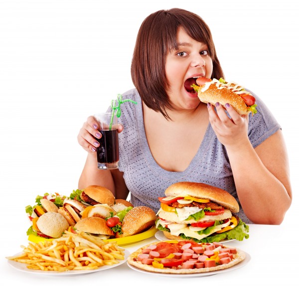 2-Overweight-woman-eating-fast-food-it-is-the-worst-food