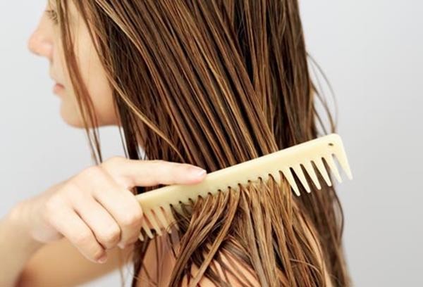 getty_rf_photo_of_woman_combing_hair (Copy)