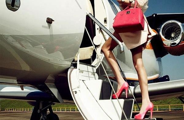 girl-travel-airplane-compressed