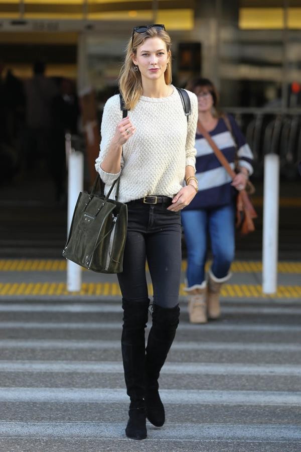 Karlie-Kloss-wore-black-knee-high-boots-her-statement-piece