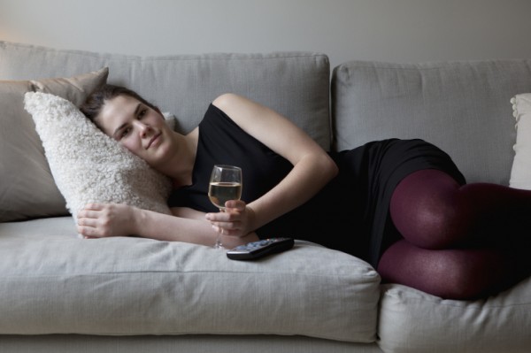 Woman relaxing on sofa