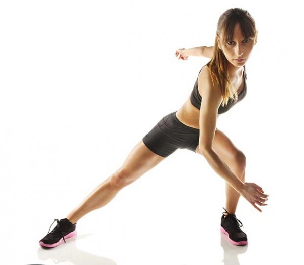Beautiful athlete woman doing fitness exercise