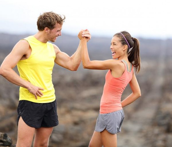 man-woman-high-five-10-daily-habits-blast-belly-fat