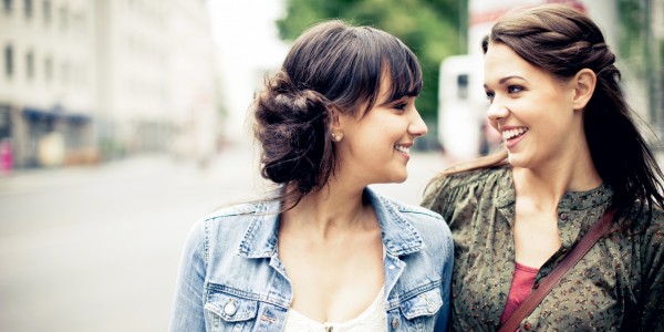 Two young women talking