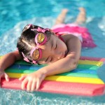 Girl_with_styrofoam_swimming_board (Custom)