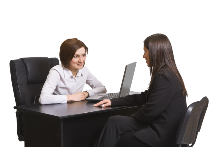 Woman-at-interview-leaning-forward