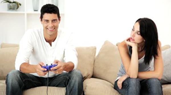 stock-footage-man-playing-video-games-and-ignoring-his-wife (Copy)