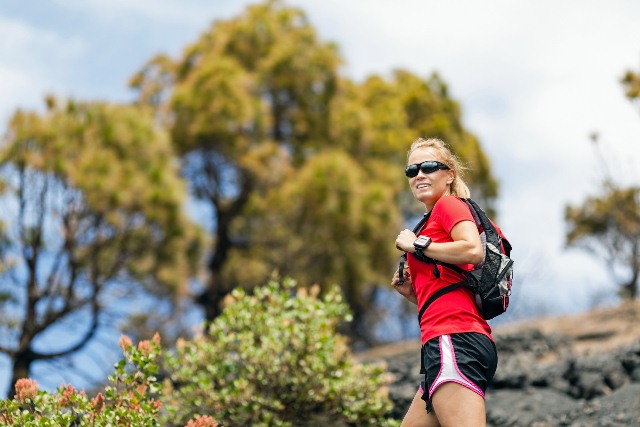 Hiking woman in mountains. Fitness and healthy lifestyle outdoors in summer nature, La Palma, Canary Islands