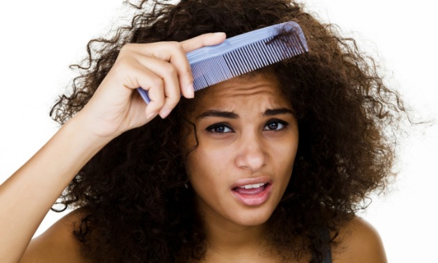 woman-combing-hair